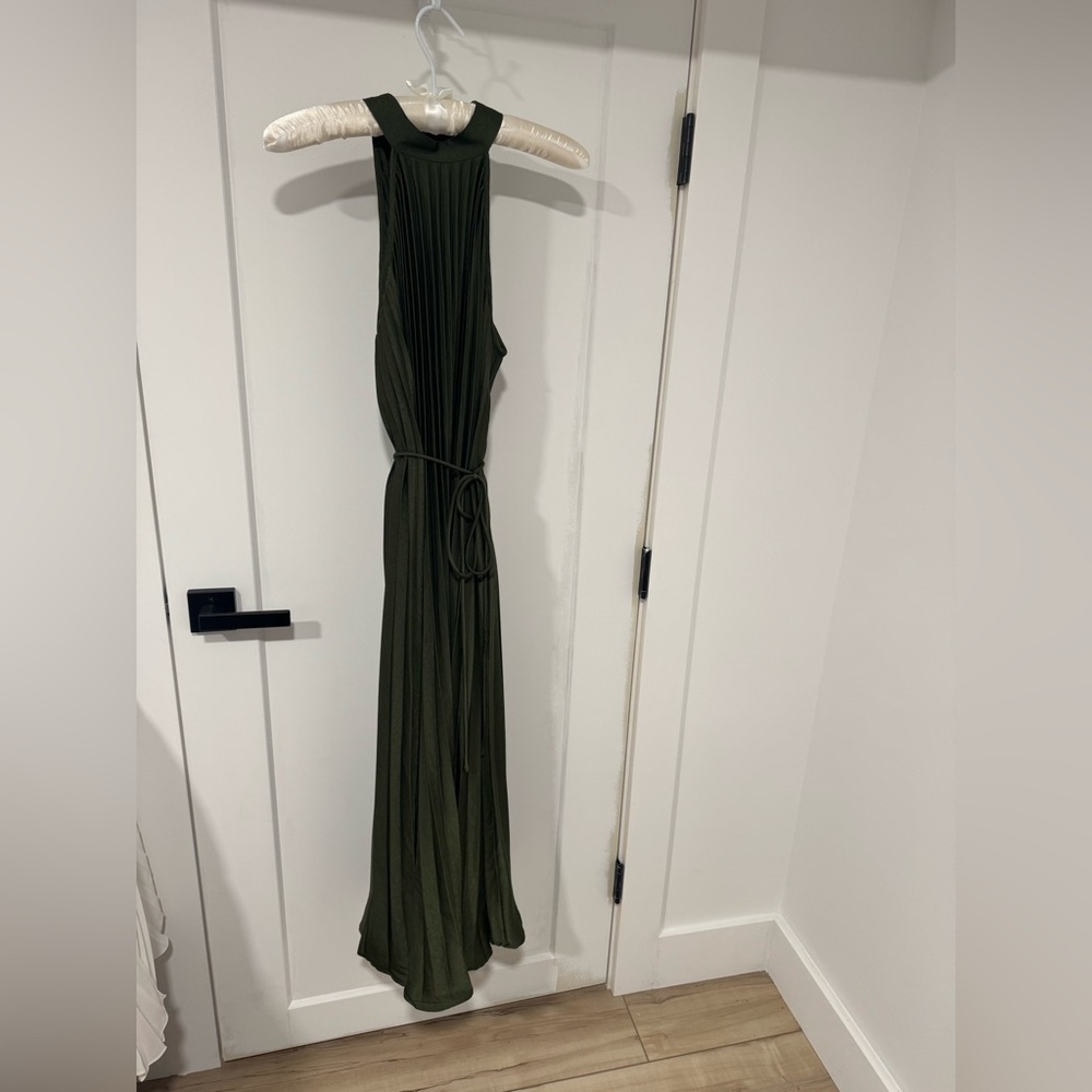 Deep green pleated halter neck dress